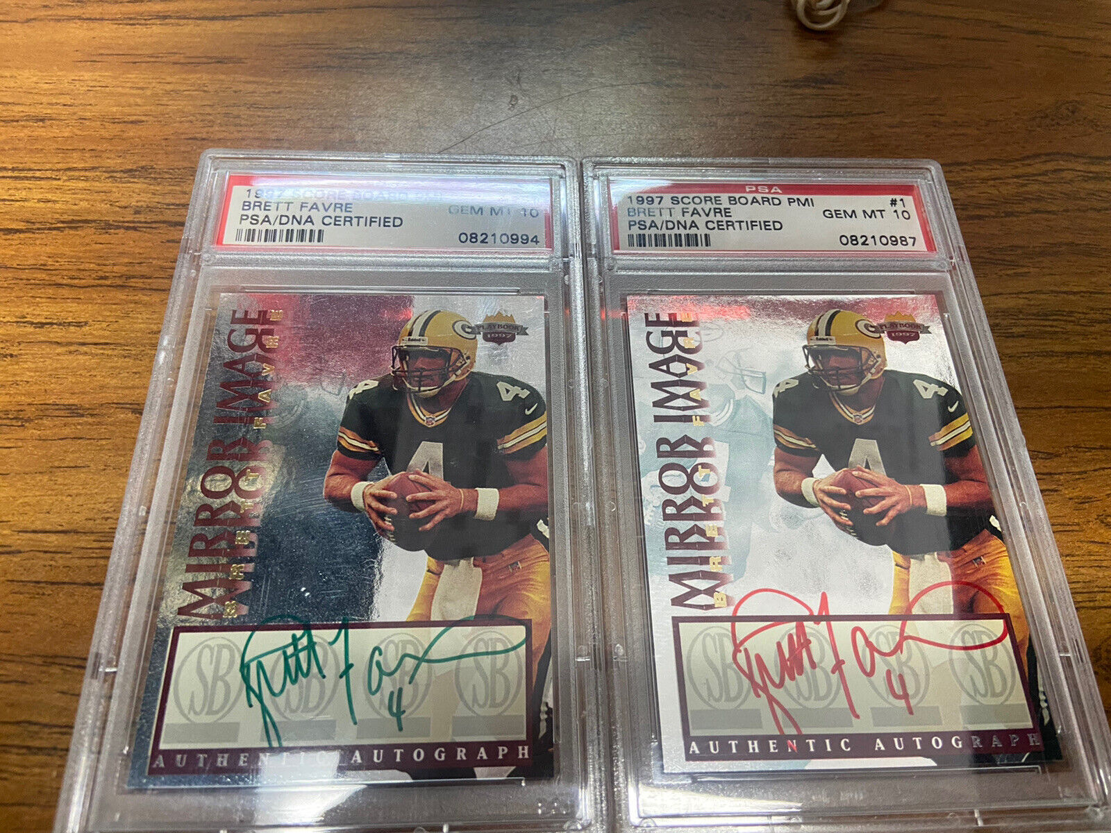 2x 1997 Score Board Mirror Image Autos #1 Brett Favre Green & Red Ink PSA 10 MT