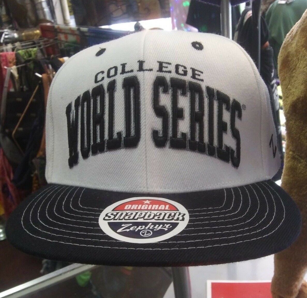 College World Series Snapback Hat by Zephyr