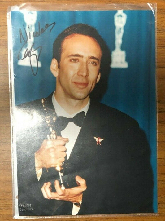 Autographed Photo Of Nicolas Cage With Award 8x10 Classic American Actors 