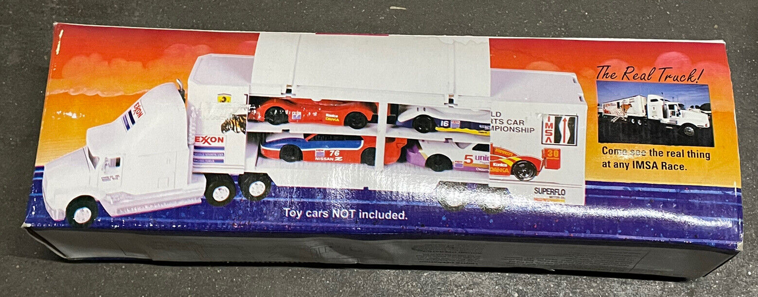 EXXON TRUCK - #4 RACE CAR CARRIER TRUCK 1995 RARE MUST HAVE HOLDS 4 CARS