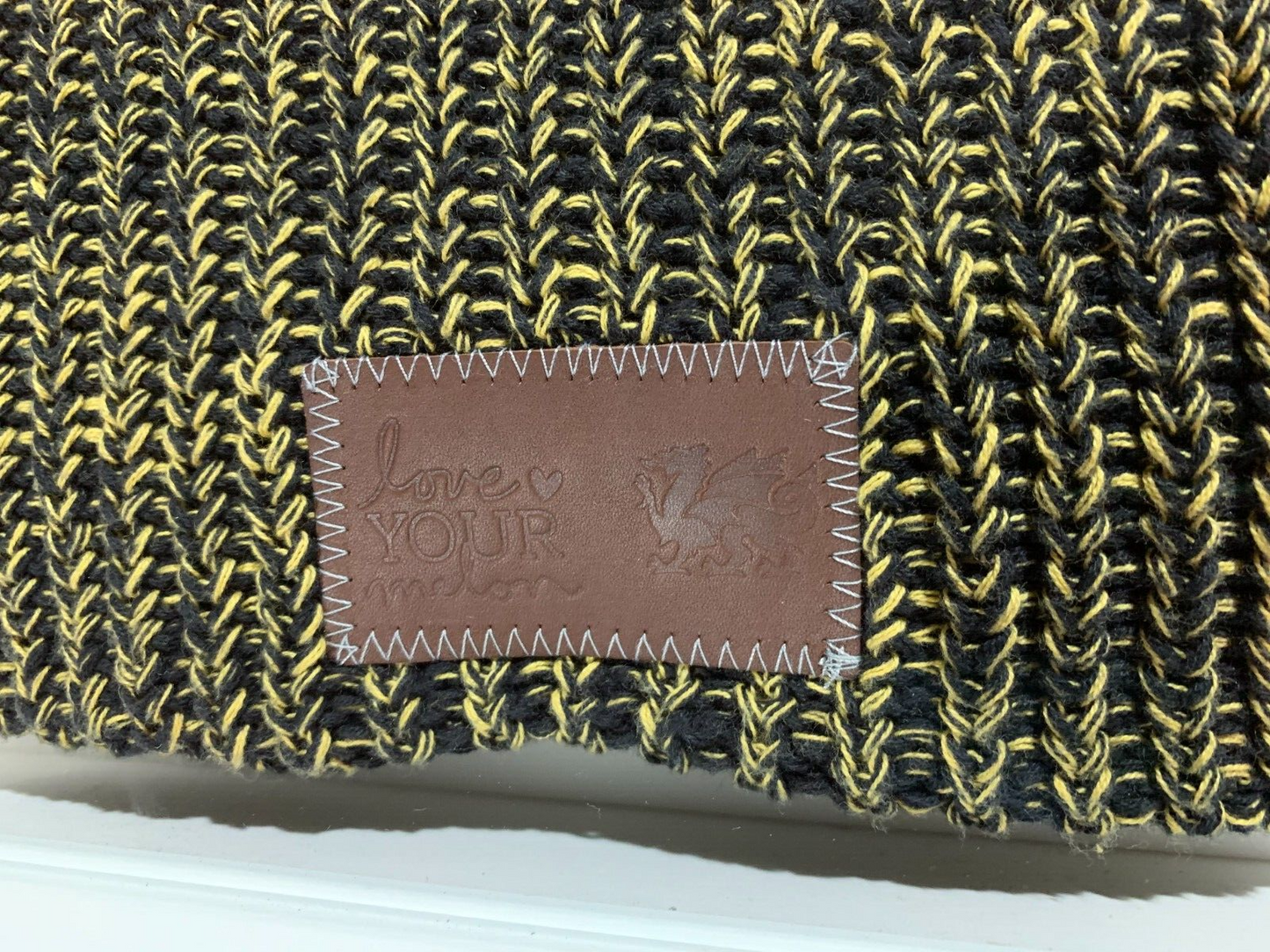 FRAMED Love Your Melon x Cambria Knit Beanie Black & Yellow Leather Patch